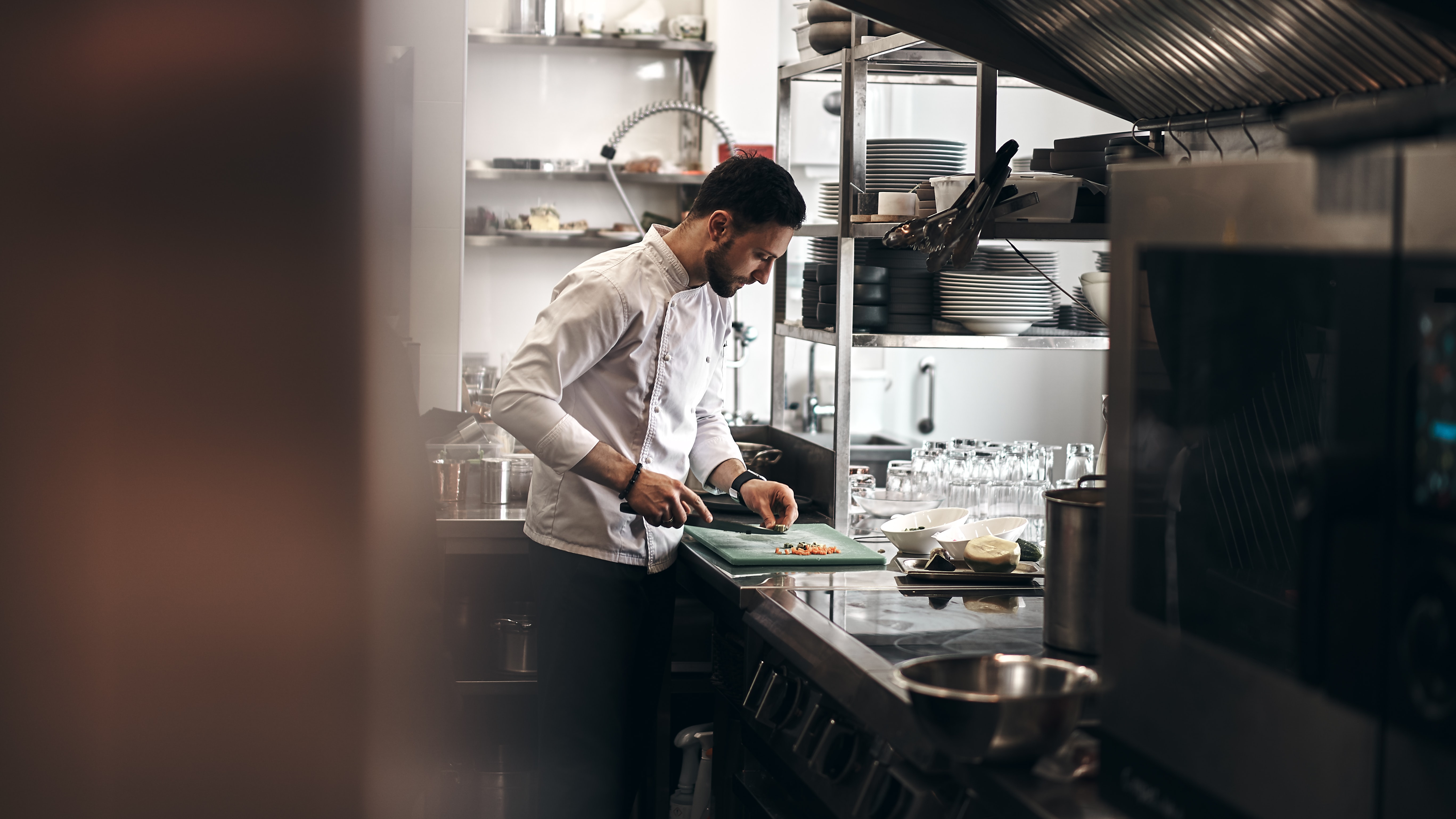 a chef cutting vegetables